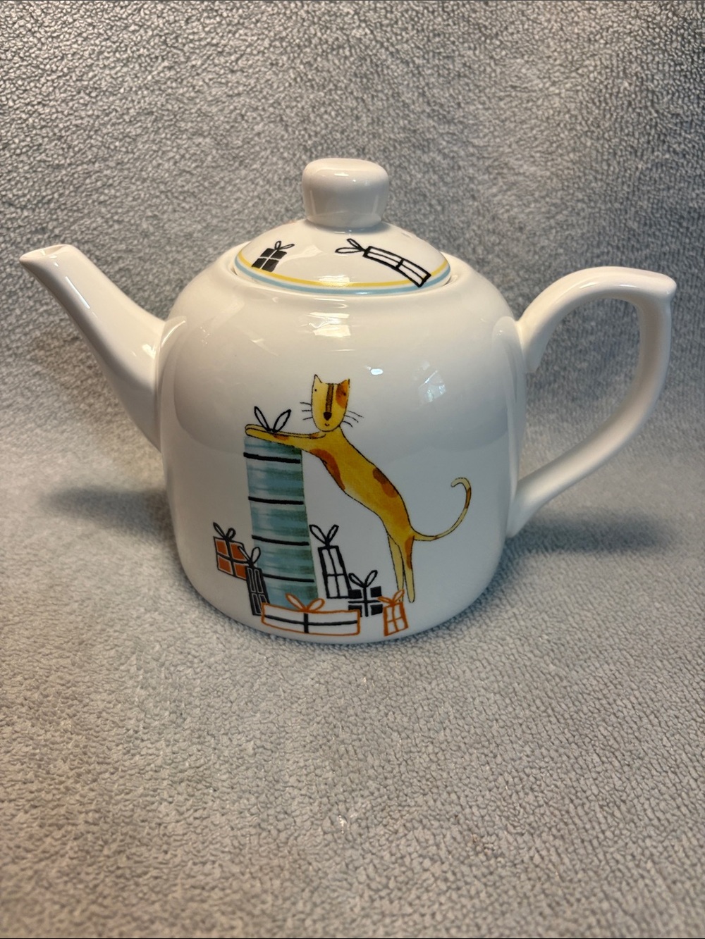 Sweet White Ceramic Teapot with Yellow Cats and Gifts motif. So cute!